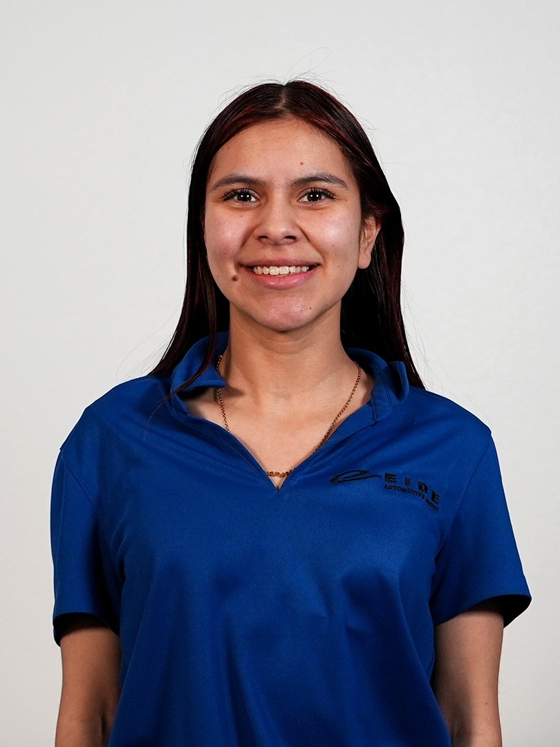 Receptionist/Accounts Payable Maryann Hernandez in Office at Eide Chrysler